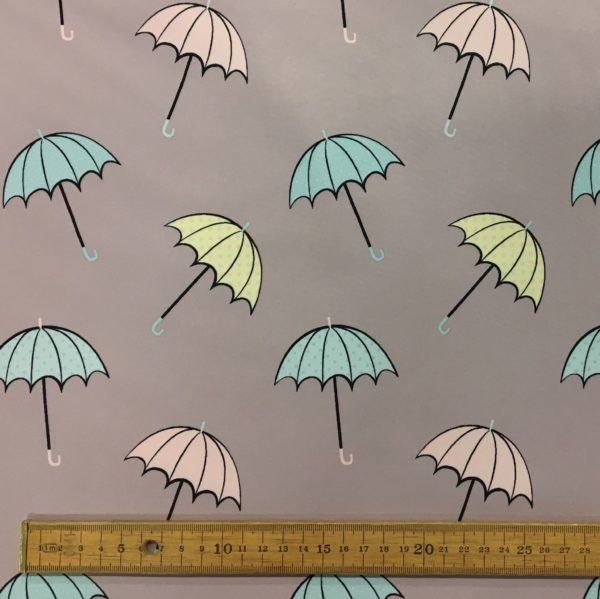 Fleece Backed Soft Shell Fabric - Umbrellas on Lilac