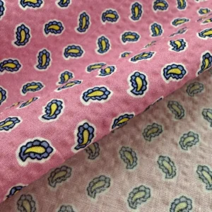100% Cotton Seersucker - Pink with a Yellow Motif