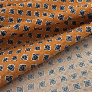 100% Cotton Seersucker - Tangerine with Blue Motif